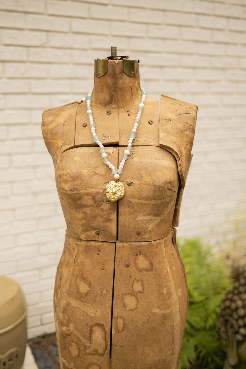 BRASS FLEUR-DE-LIS, PEARL AND SEA GLASS NECKLACE